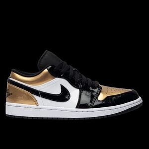 The Air Jordan 1 Low “Gold Toe” Youth 5.5 (not kiddie size)
